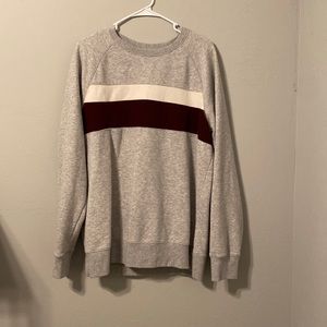 Grey with red and white stripes goodfellow & co crewneck sweatshirt.